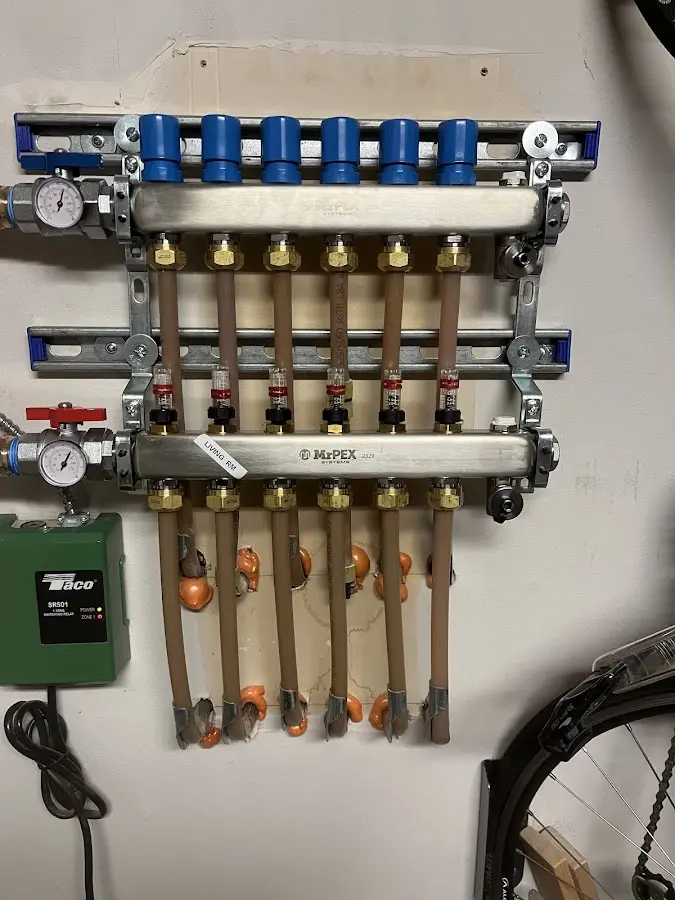 Plumber performing Leak Detection at a residential property in Salford